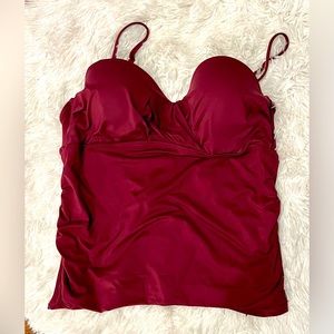 One piece burgundy swimsuit, tags removed but never worn.